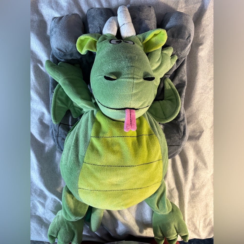 Vintage Happy Nappers Dragon with Zipper holding Castle Home Sweet Home Pillow.